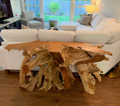 Wooden console table with natural design in a living room setting